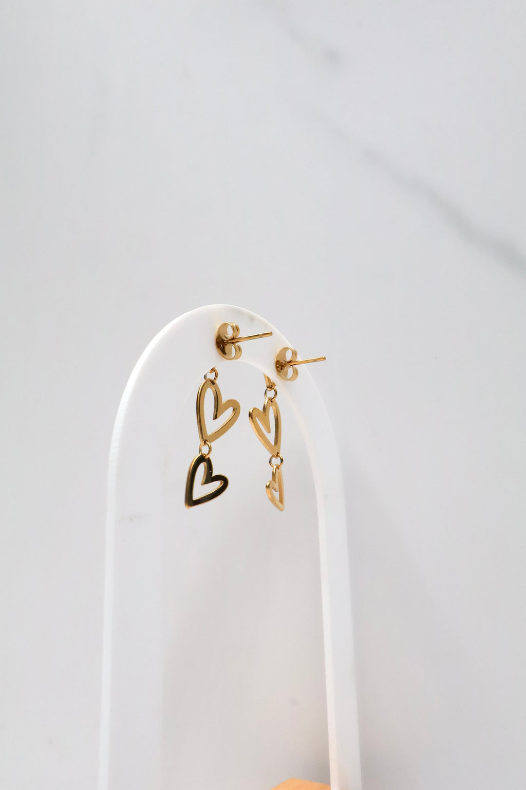 Oorbellen met 3 zwevende hartjes