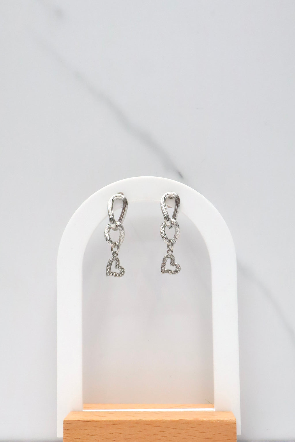 Oorbellen met schakel en hangend hartje