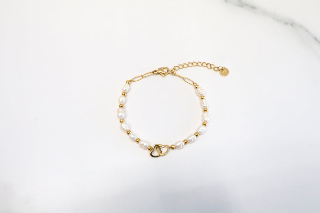 Armband met parels en verbindingshartje