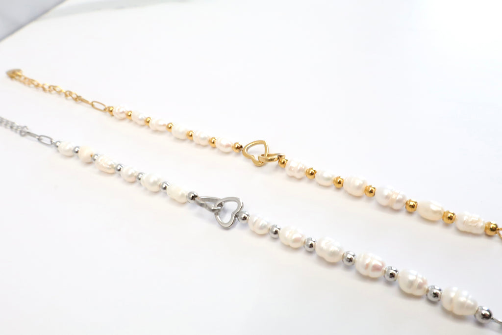 Armband met parels en verbindingshartje