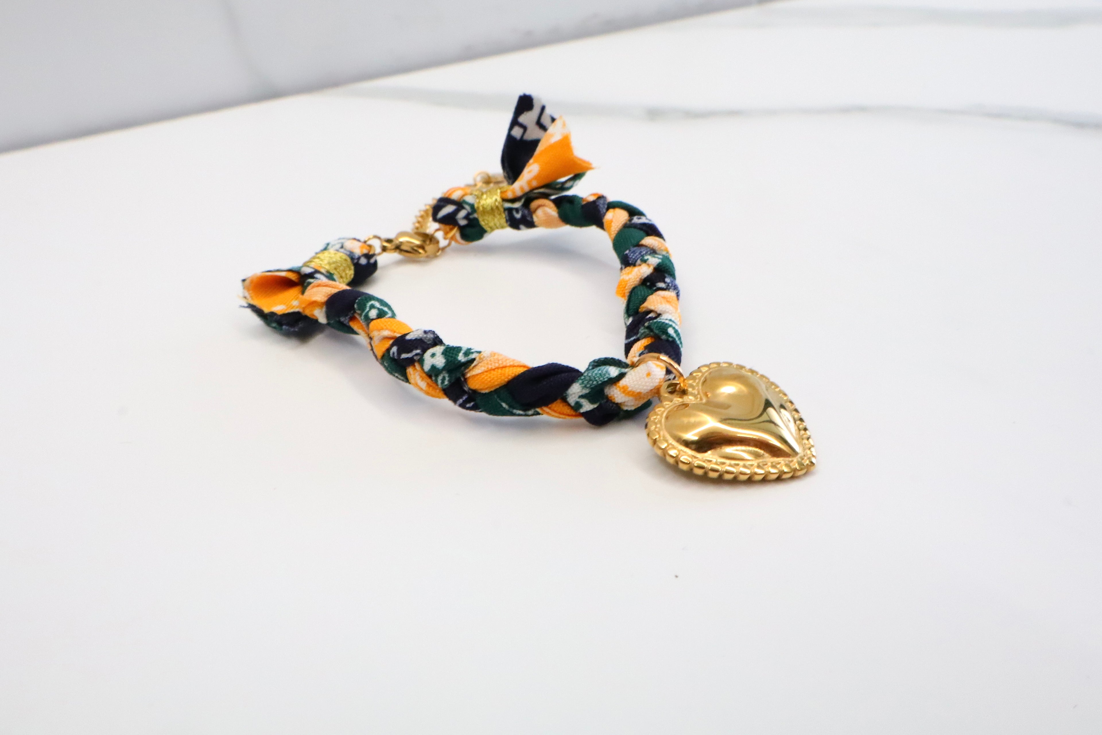 Lint armband met hart bedel