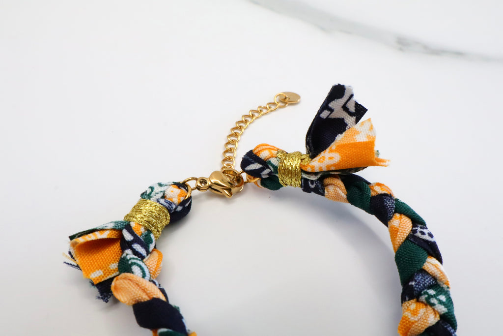 Lint armband met hart bedel