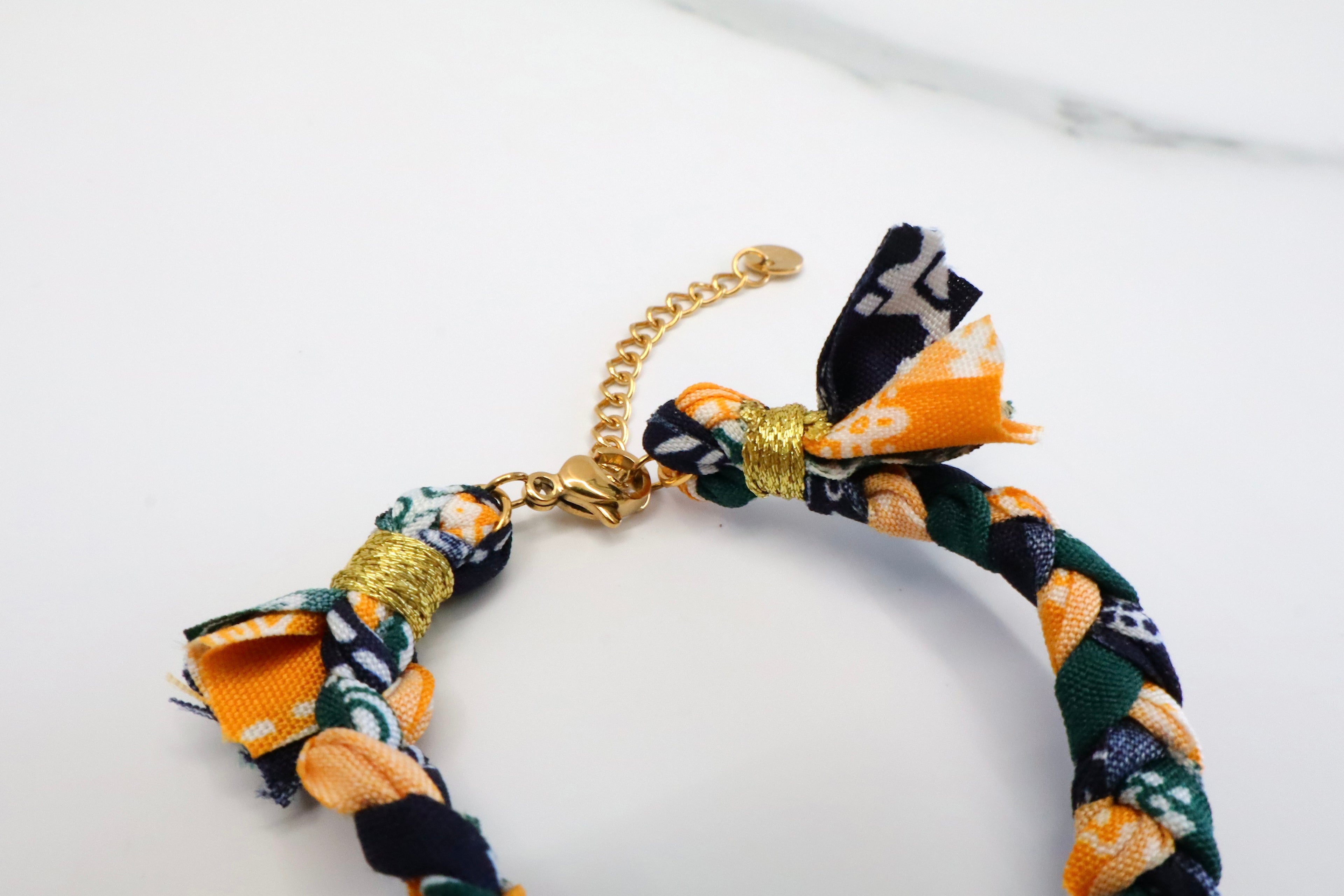 Lint armband met hart bedel